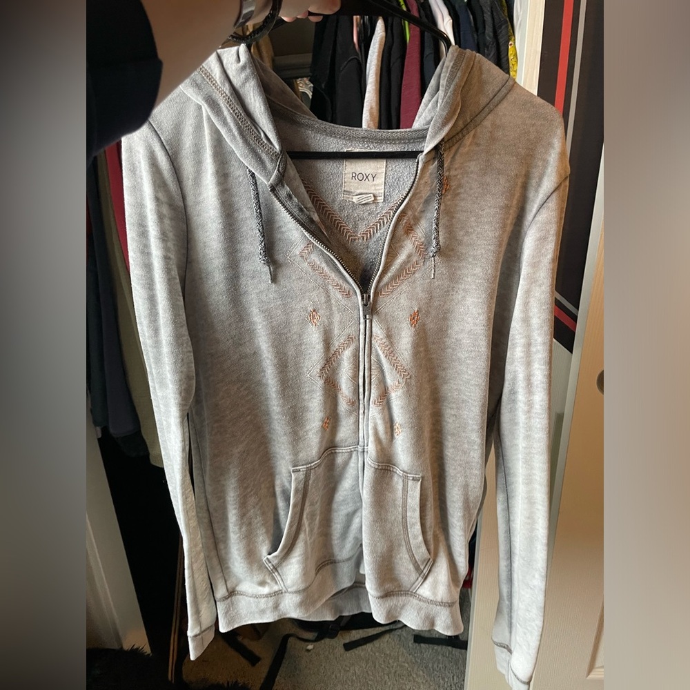 Very thin ROXY zip up great for warmer days with pink and white details.